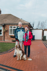 Portrait of a Senior Couple and Their Dog