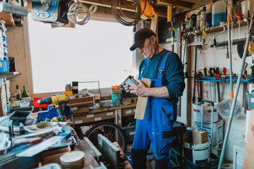 Senior Man in his Wood Workshop