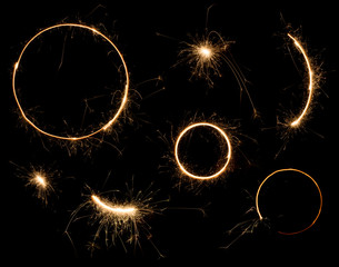 Sparkler design elements. Bengal fire stars fireworks set isolated on black.