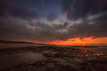 Fototapeta na wymiar sunset at palmahim beach, Israel