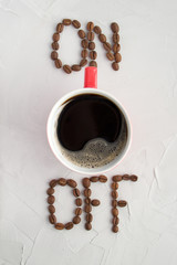 Empty Cup of espresso like a switch ON a gray background. Creative coffee Cup concept