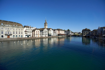 Obraz na płótnie Canvas Grossmünster Church in the city centre of Zurich in summer sunshine with clear blue sky
