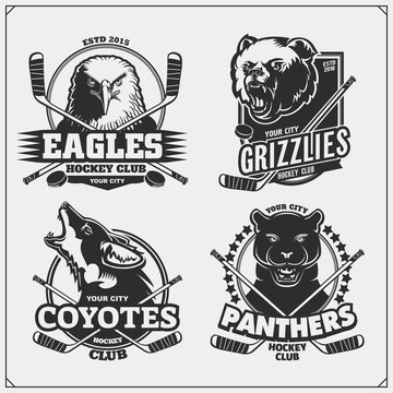 Set of hockey badges, labels and design elements. Sport club emblems with grizzly bear, panther, coyote and eagle. Print design for t-shirts.
