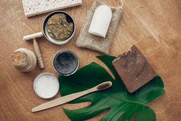 Zero waste flat lay. Natural soap, solid shampoo, metal razor, crystal deodorant, charcoal...