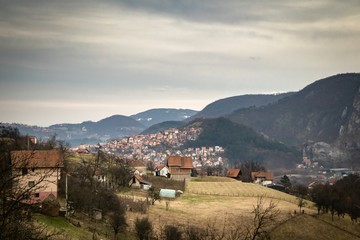 Mountain range near the Uzice town in Serbia. Winter cloudy day.