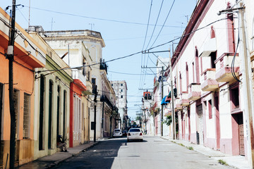 Fototapeta premium Empty street in the summer sun in Havana