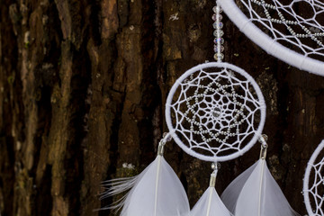 Handmade dream catcher with feathers threads and beads rope hanging