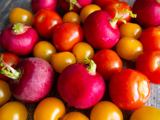 Juicy fresh cherry tomatoes and radishes