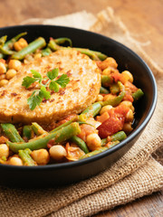 Green Bean and Tomato Stew with Chickpeas and a Vegan Cutlet