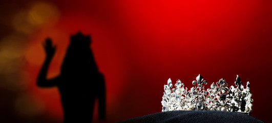 Silver Diamond Crown of Miss Pageant Beauty Universe World Contest sparkle light on black pillow, ready for wear Most beautiful Winner, studio lighting super red gradient background dramatic © Jade