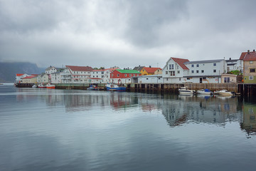 Fototapeta na wymiar The quiet harbor of Henningsvaer, a traditional fishing village on the Lofoten archipelago
