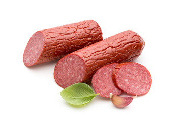 Salami smoked sausage, basil leaves on white background cutout.