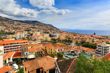 Fototapeta na wymiar Beautiful vibrant cityscape view of the skyline of the city Funchal on the island Madeira in summer