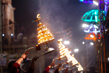 VARANASI, INDIA- 23 JANUARY 2017 : A Hindu priest performs the Ganga Aarti ritual in Varanasi