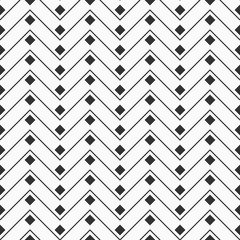 Abstract seamless pattern of zigzag lines and filled rhombuses.