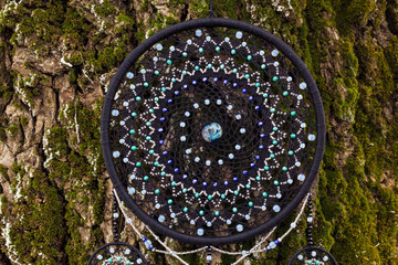 Handmade dream catcher with feathers threads and beads rope hanging