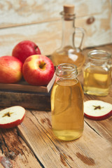Apple cider vinegar. Bottle of apple organic vinegar
