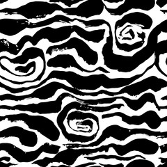 Brush painted zebra seamless pattern. Black and white stripes grunge background.