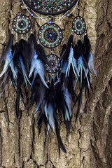 Handmade dream catcher with feathers threads and beads rope hanging