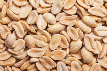 Peanuts closeup texture. Healthy nut diet food background.