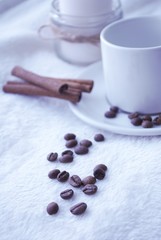coffee beans and cinnamon sticks