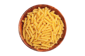 Pile of yellow pasta in wooden bowl isolated on white. Raw food dinner ingredient in round kitchen container background.