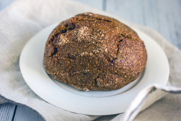 Background about diet food - bread and measuring tape for the body. Whole grain healthy bread without yeast and sugar for weight loss. Bread from seedlings.