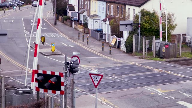 A Train passes a Level crossing in London