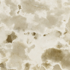 Gold luxury ink and watercolor textures on white paper background. Paint leaks and ombre effects. Hand painted vintage texture.