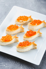 Delicious appetizer with red caviar.