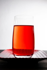 red limonade in transparent glass