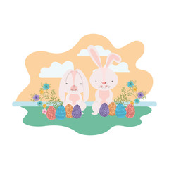 easter rabbits on landscape with egg icon