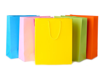 Colourful paper shopping bags isolated on white