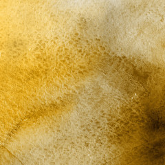 Gold luxury ink and watercolor textures on white paper background. Paint leaks and ombre effects. Hand painted vintage texture.