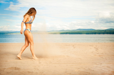 Fototapeta premium woman in bikini on the beach