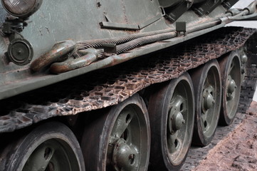Fototapeta na wymiar Heavy military tank tracks close up