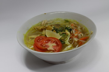 a bowl of Soto, an Indonesian most popular food