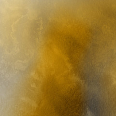 Gold luxury ink and watercolor textures on white paper background. Paint leaks and ombre effects. Hand painted vintage texture.