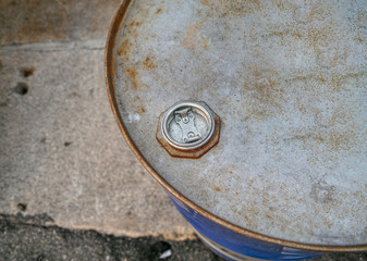 detail of rusty can for industrial oil