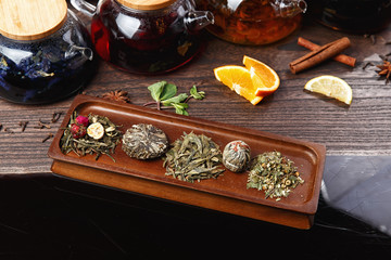 various teas on wooden panels. selective focus
