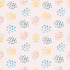 Light seamless watercolor pattern with mess of rounded color stains on pale pink background. Beautiful hand drawn watercolour ornament for textile, wrapping paper, wallpaper, surface design
