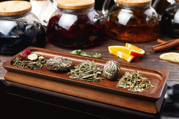 various teas on wooden panels. selective focus