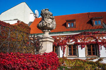 Historical building and decorative vase of Vrtba Baroque Garden in Prague