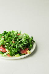 healthy vegan avocado and beet salad in white bowl