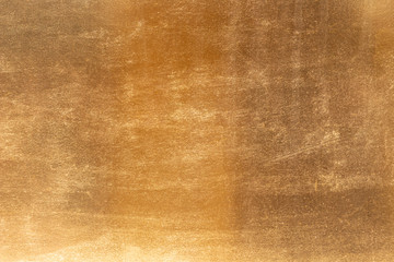 Shiny yellow leaf gold metal texture and background