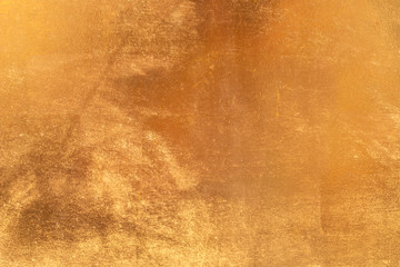 Shiny yellow leaf gold metal texture and background