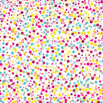 Vector of seamless pattern with many bright ellipses looks like confetti, splash dot arranged in chaotic and randomly. Design for textile, fabric, decoration, wallpaper, wrapping or packaging 
