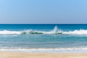 Background of clear blue sky and sea waves