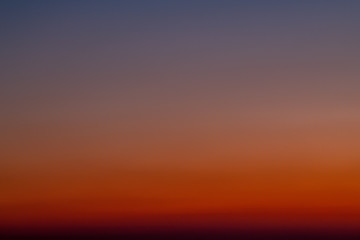 Sky gradient from blue to orange sunset