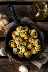 Oven baked button mushrooms with garlic and cheese
